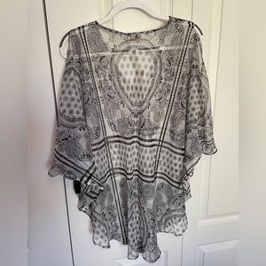Poncho style top.
